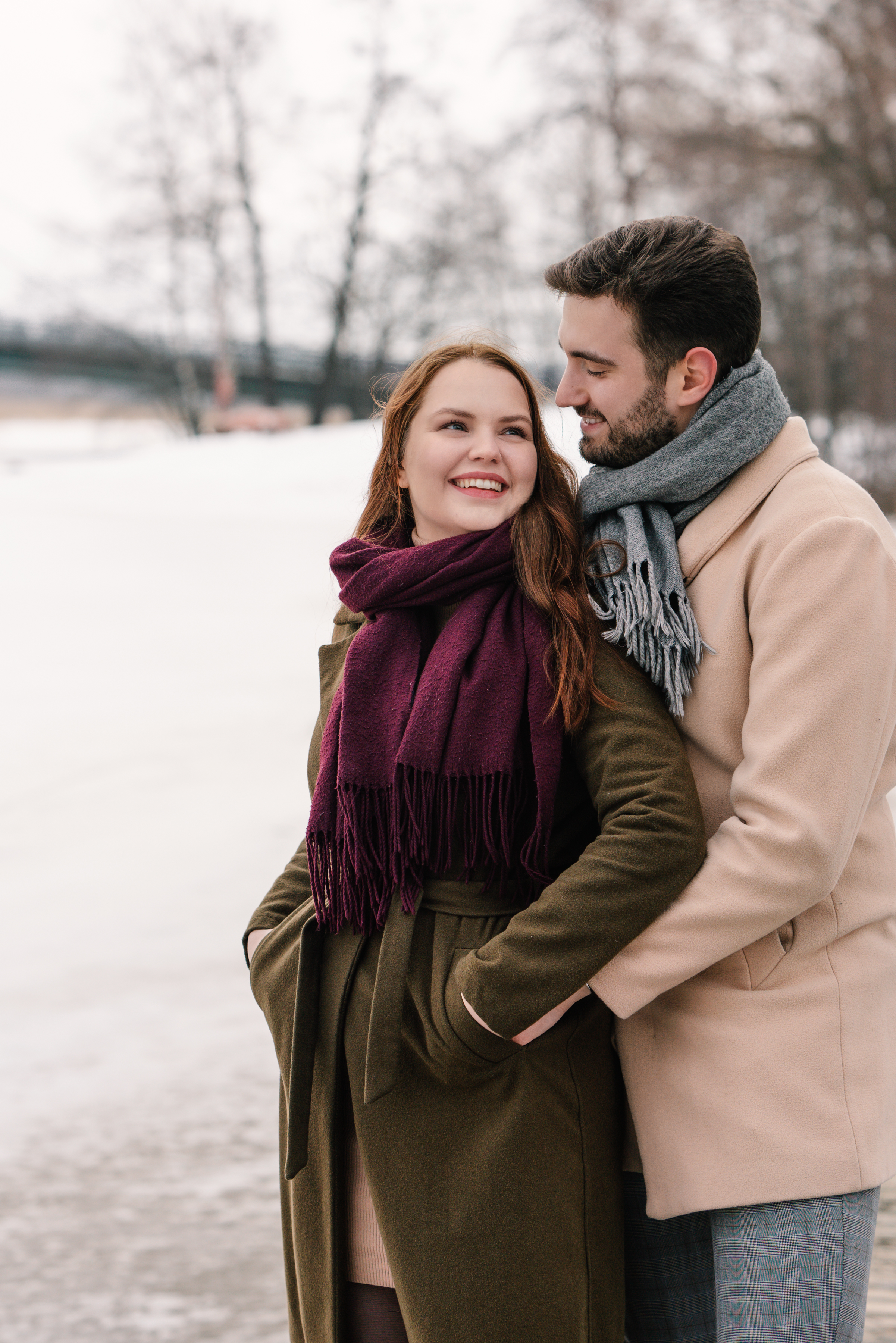 Romantic portrait of a couple in a snowy landscape
