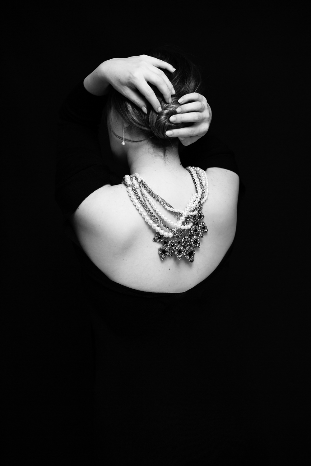 Elegant portrait showcasing pearls and intricate details
